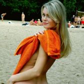 Cute blonde with nice natural boobs on nudist beach in Moscow