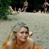 Cute blonde with nice natural boobs on nudist beach in Moscow