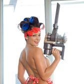 Stunning pinup brunette Jamie Graham shows great ass and big tits while cleaning the house